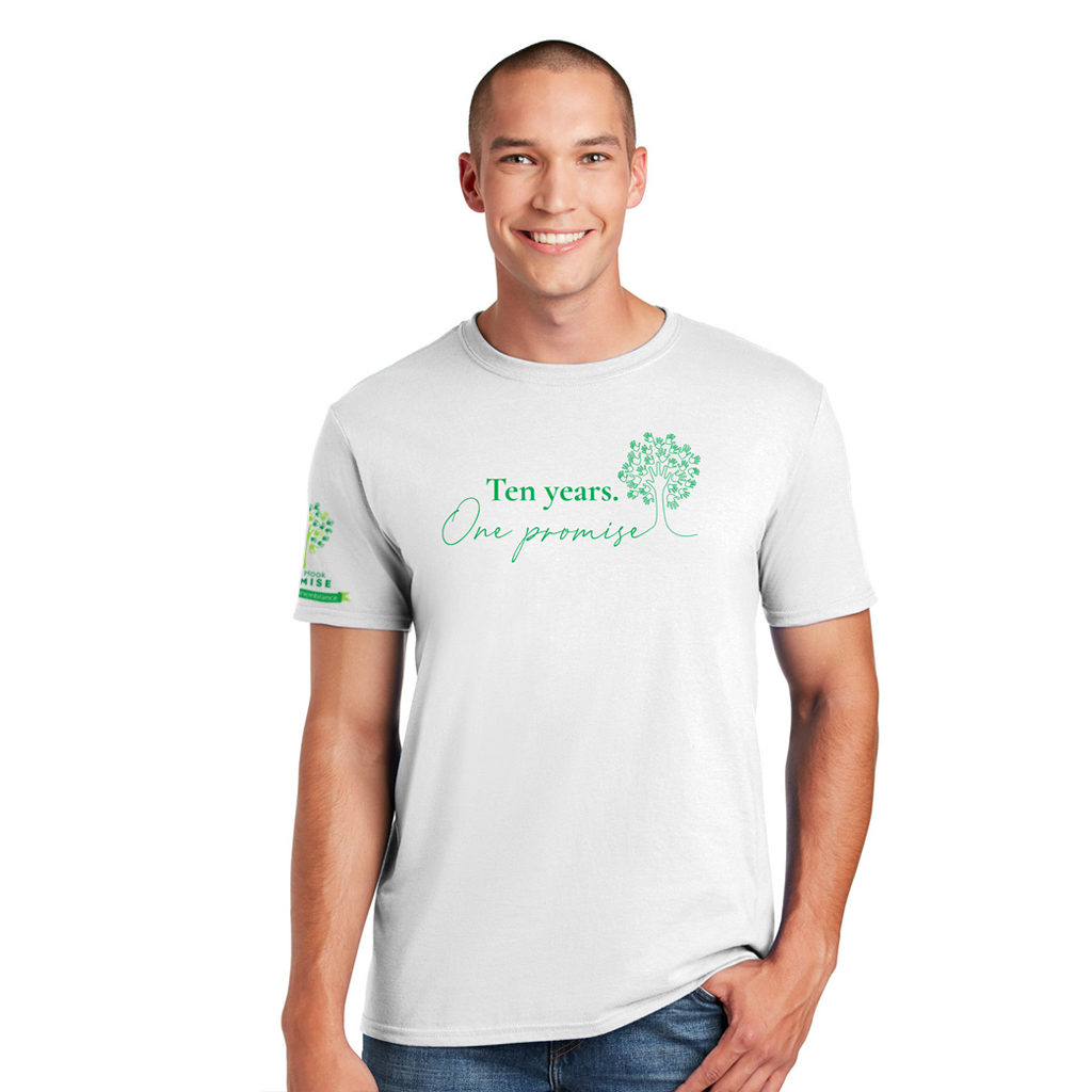 Man wearing Sandy Hook Promise's white Classic Remembrance T-Shirt. Artwork text: Ten years. One Promise